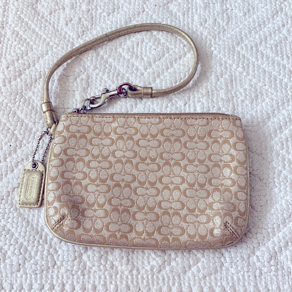 2/$35 Coach gold/Platinum wristlet